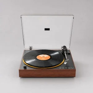 FiiO TT11 mặt trước: thân gỗ vân nâu, mặt đen, đĩa than nhãn cam, viền vàng platter, tay cần và kim bạc, núm và hàng nút START STOP, nắp bụi trong mở, nền xám studio
