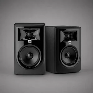 Cặp loa kiểm âm JBL 306P MkII trên nền xám studio: waveguide Image Control bóng, woofer 6,5 inch, logo JBL Professional, thùng loa đen mờ hiện đại.