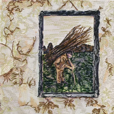 Bìa album Led Zeppelin IV 1971: hình người mang củi trước tường đổ nát