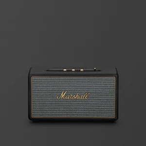 Marshall Stanmore IV đen mặt trước với lưới vải xám salt-and-pepper và logo Marshall vàng đồng
