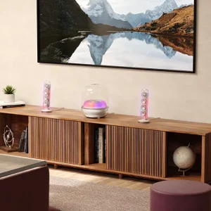 Harman Kardon SoundSticks 5 trên bàn: loa vệ tinh và subwoofer, ánh sáng màu